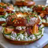 Cottage cheese bagels topped with smoked salmon, cream cheese, and fresh dill, perfect for a high-protein breakfast.