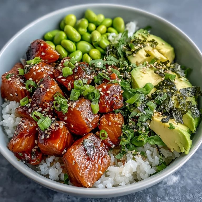 Beautifully arranged Salmon Poke Bowl, a healthy and colorful Hawaiian lunch masterpiece.